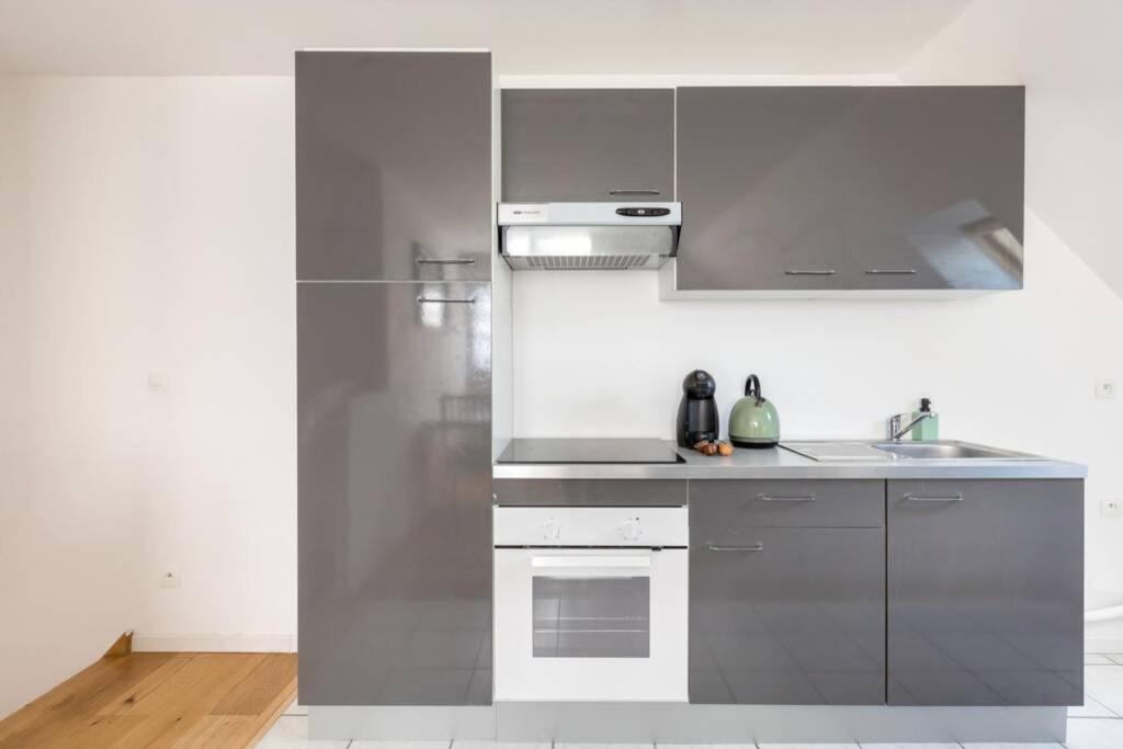 Grand Confort, Appartement Osny Εξωτερικό φωτογραφία